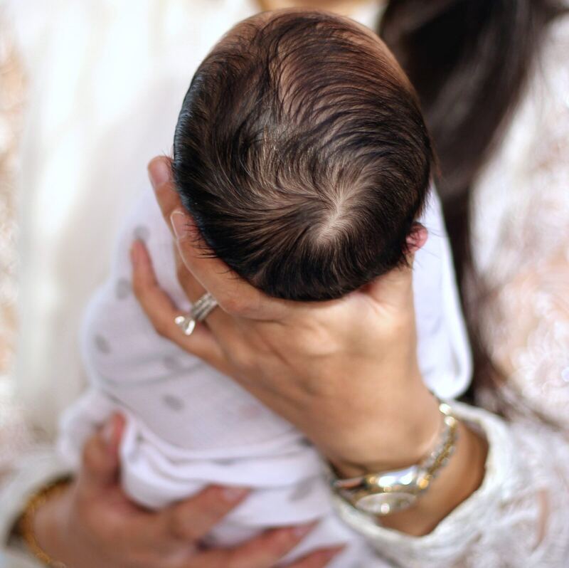 Mother holding newborn
